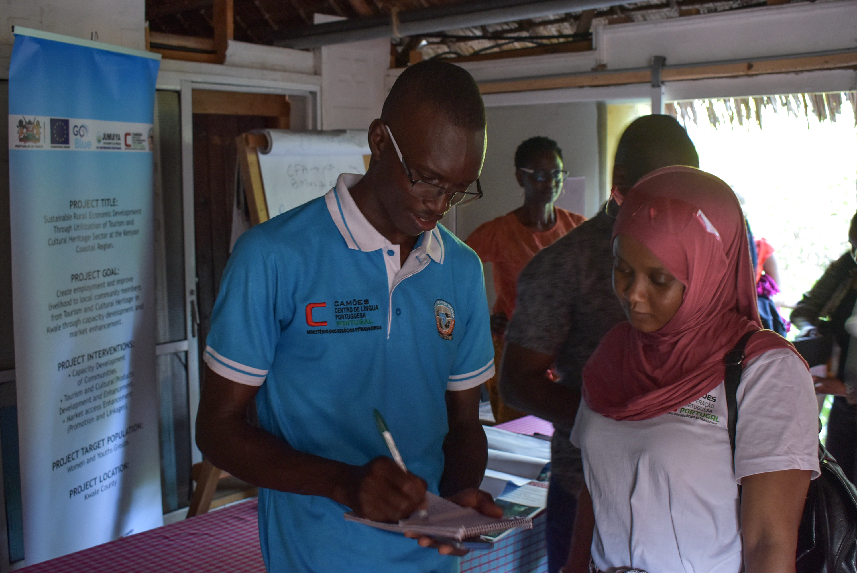 Two grantees networking at Crab Shack Dabaso